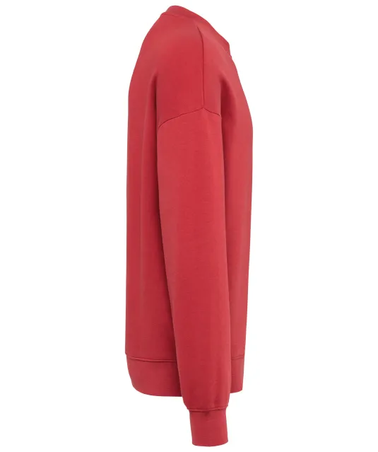 K4032 - Ecologische oversized uniseks sweater met ronde hals Terracotta Red