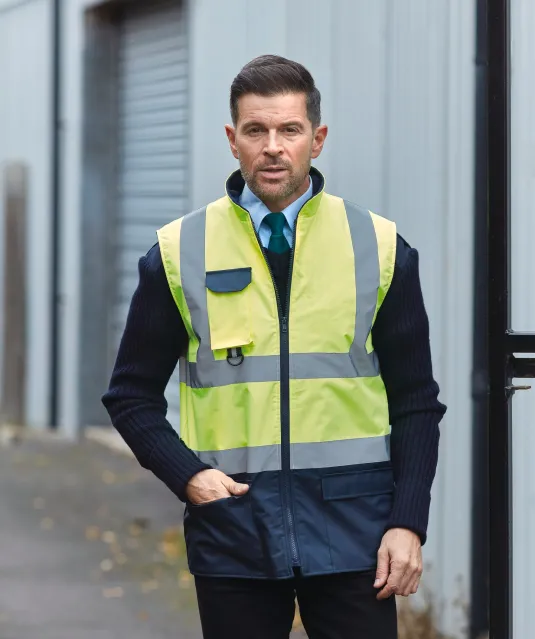 YHV005 - Gewatteerde veiligheidsbodywarmer Hi Vis Orange / Navy