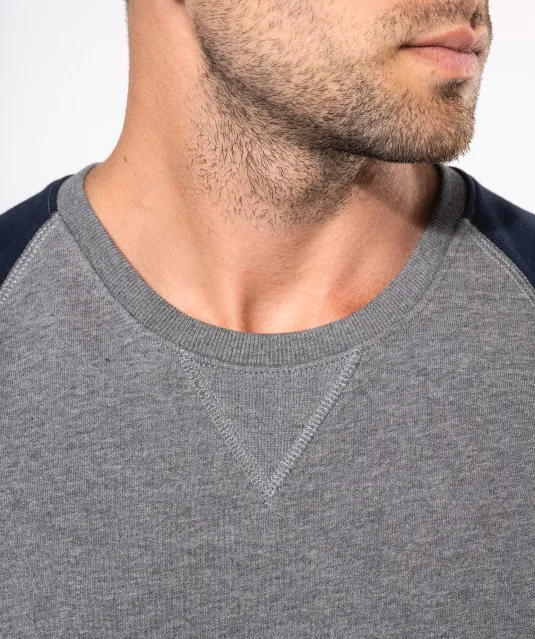 K491 - Tweekleurige herensweater BIO French Terry ronde hals raglanmouwen French Navy Heather / Grey Heather